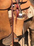 Tooled saddle water bottle holder